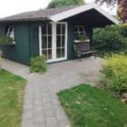 Donkergroen Zweeds tuinhuis